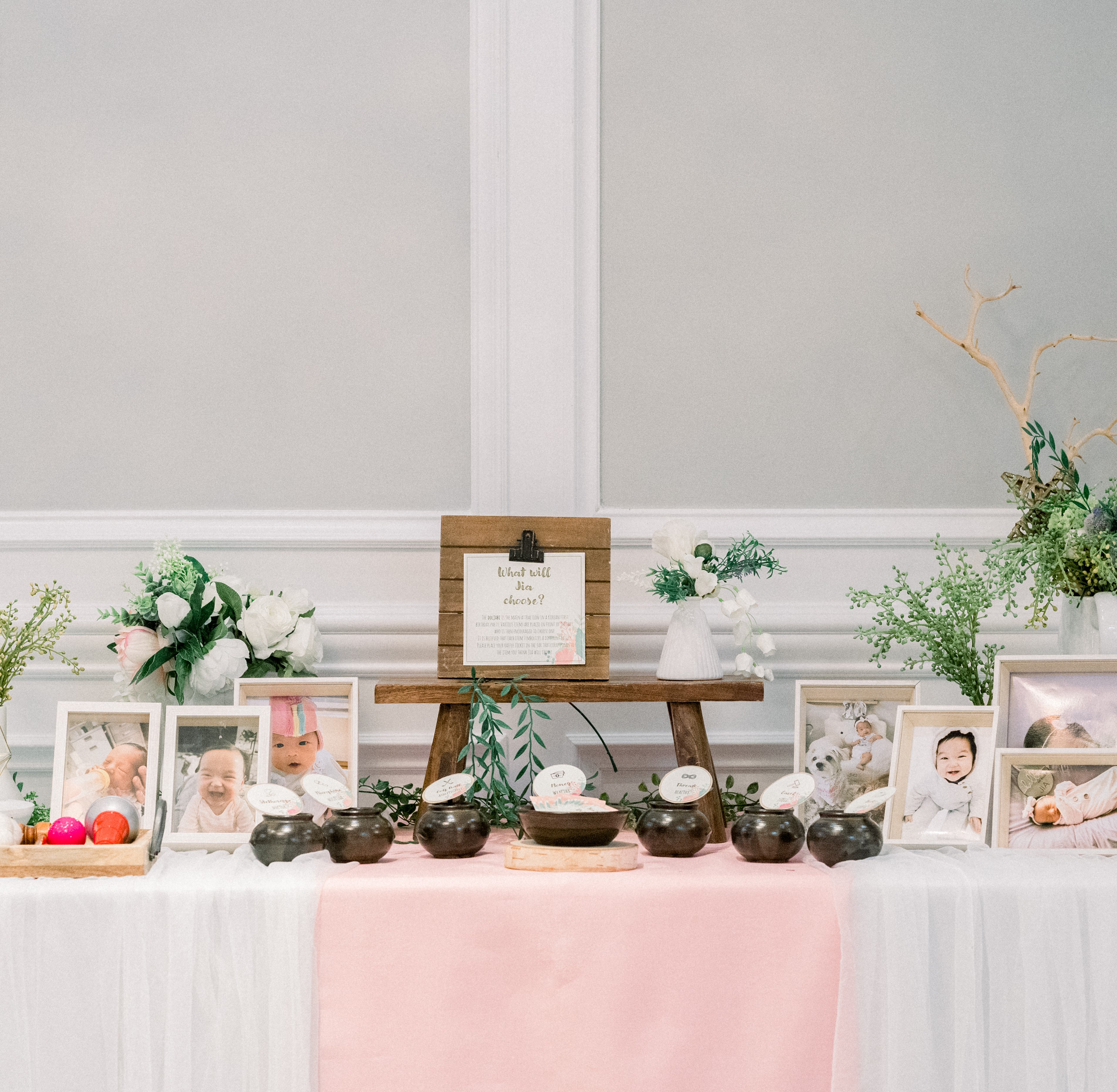 JIA Dol centerpiece with balloons and traditional setup